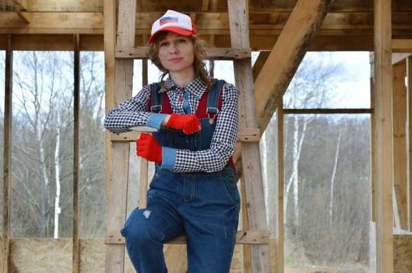 builder hard hat portrait black background